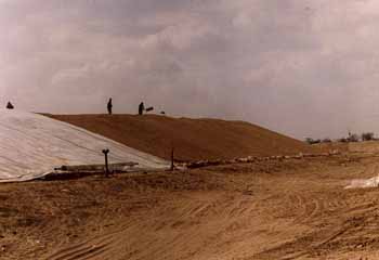 Welding strips of overliner together and flattening the ridge