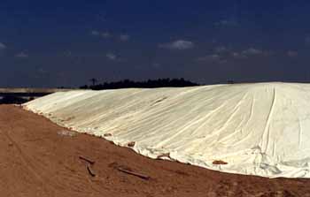 Welded overliner in place